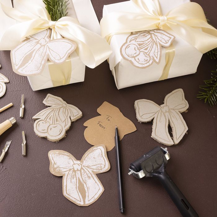 Til-og-fra-kort i linoleumstrykk