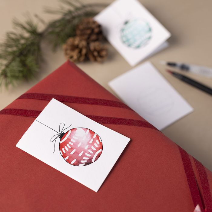 Til-og-fra-kort med tegnegummi og akvarell