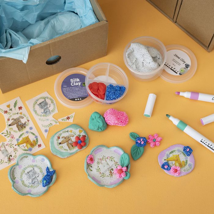 Stone Clay dekorert med søte dyremotiver