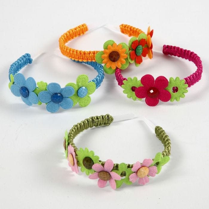 Hårbøyle med filtblomst og cabochoner