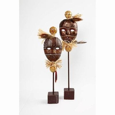 Afrikanske masker på pinne