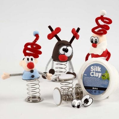 Julefigur av Silk Clay på fjær