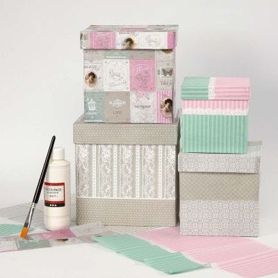 Store esker kledd med decoupagepapir