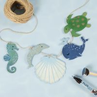 Guirlande med havdyr i træ dekoreret med hobbymaling